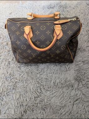 Louis Vuitton Brown Monogram Canvas Duffel with Natural Vachetta Handles